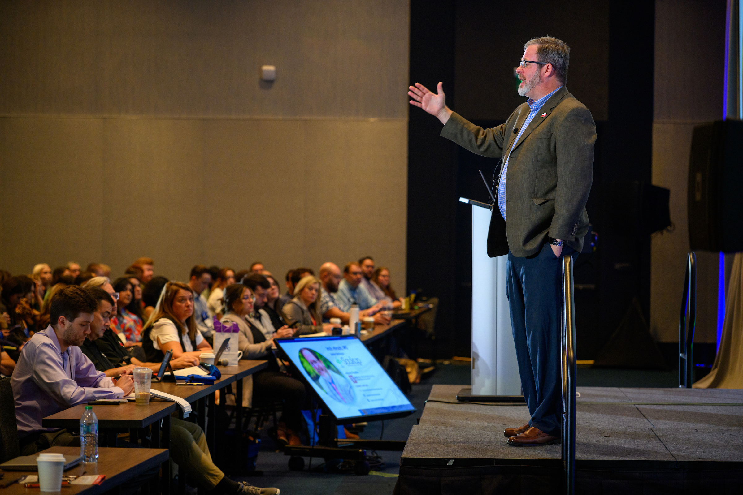 Josh Hirsch speaking at a conference